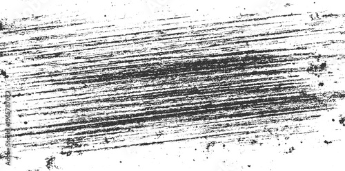 Black diagonal grunge brush strokes and speckles on white background texture abstract