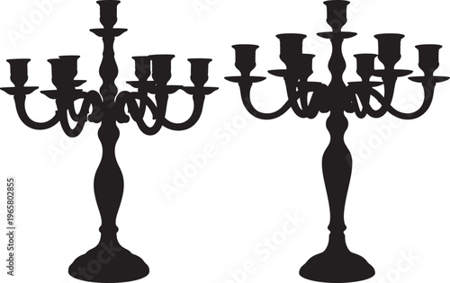 Two ornate vintage candelabra silhouettes isolated on white background, decorative lighting element for gothic or classic interior design