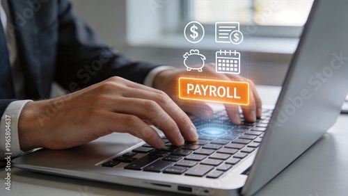 Businessman typing on laptop with digital payroll interface money icons budget calendar and finance symbols floating above keyboard modern corporate accounting salary management
