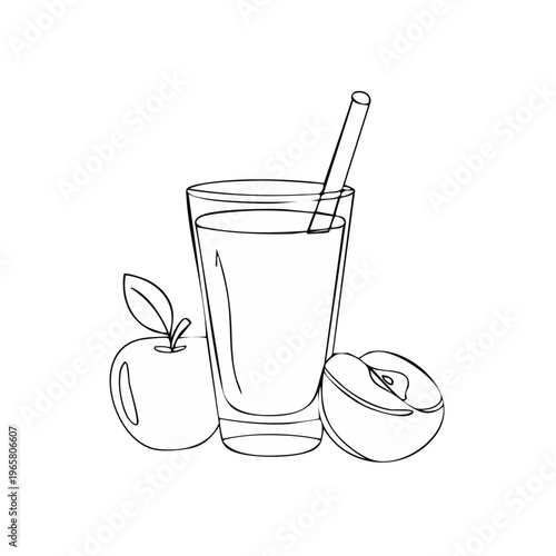 Fresh apple juice in a tall glass with a straw and whole and halved apples