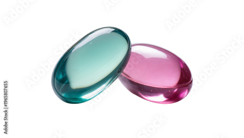 Quadro su tela Glossy teal-green and vibrant pink translucent gel capsules overlapping, isolate