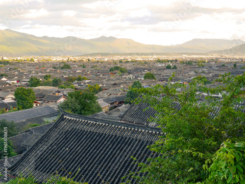 Tableau sur toile View of historic rooftops in the old town of Lijiang