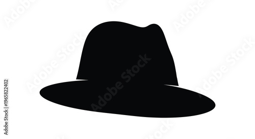 A classic fedora hat presented in dark striking silhouette