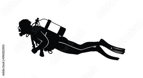 A scuba diver swimming underwater in a stark black silhouette