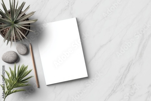 Blank notebook with pencil on marble surface surrounded by greenery and stones