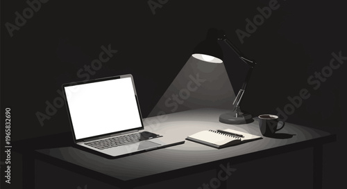 A laptop and coffee on a desk lit by a single lamp