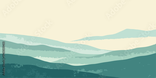 A misty morning light breaks over the blue Alps as the mountain peaks emerge from a dense fog above the forest valley at sunrise.