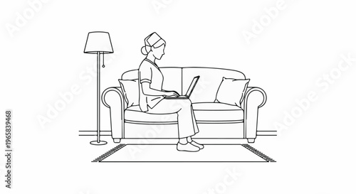 Person in uniform working on a laptop while sitting on a couch