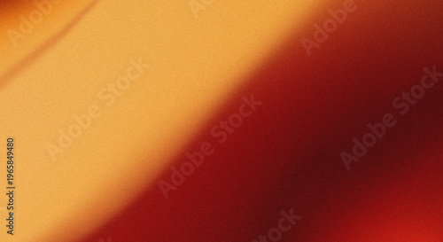 Bild auf Leinwand Abstract gradient background with warm orange and deep red tones and a grainy texture