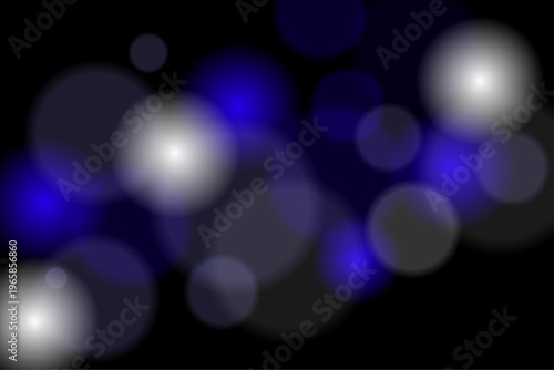 黒背景に浮かぶ青の光　 幻想的な光のデザイン素材