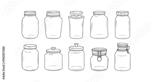 Assortment of clear glass jars with different lids for canning and storage purposes