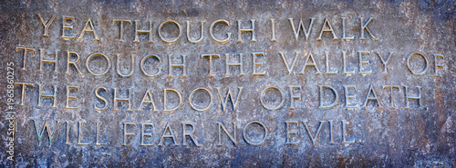Bild auf Leinwand Portion of Psalm 23 Carved into Memorial in Cemetery