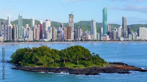 Small Rocky Island With Balneario Camboriu City Skyline in the Horizon