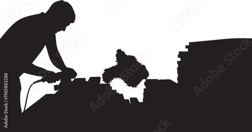 Silhouette of man using power tool on rooftop with chimney and stack of