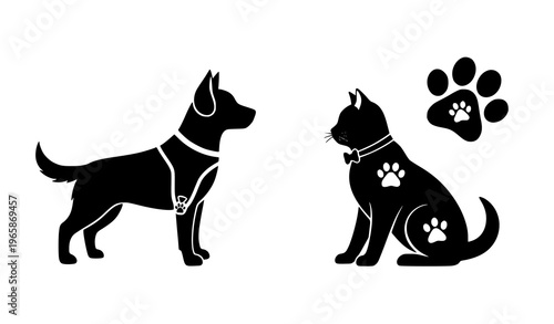 Black silhouettes of a dog and cat with paw prints