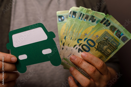 Person holding Euro banknot...