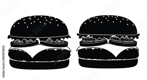 Two black silhouette burgers with tomatoes and cheese stacked creatively