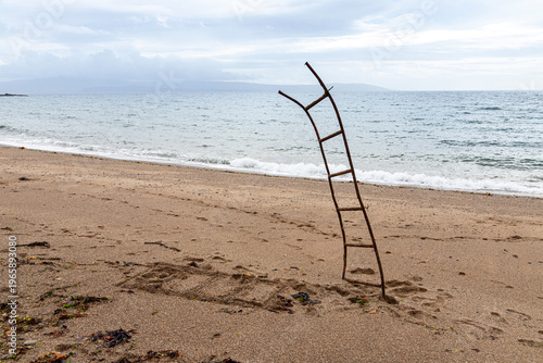 Impromptu sculpture (entitled Resurrection) made by a passing tourist on the shore of the Kilbrannan Sound near Saddell on the Kintyre Peninsula, Argyll & Bute, Scotland UK