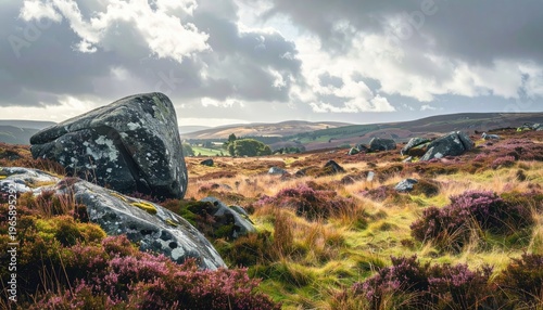 Dramatic Cloudy Sky Over Heather Moorland with Large Boulders.
