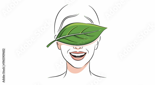 Woman smiling with a green leaf covering her eyes