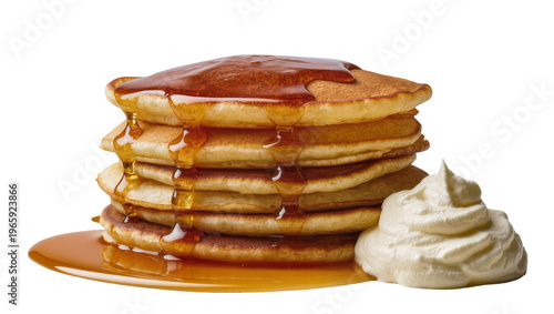 Fotografie Golden fluffy pancake stack drenched in rich amber maple syrup with a dollop of