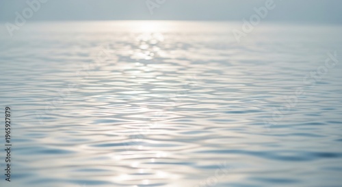 Calm Water Surface Reflecting Sunlight with Gentle Ripples.