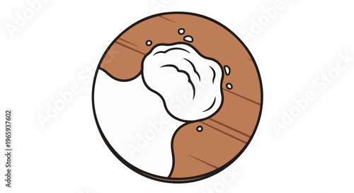 Close-up of a coconut half with white flesh and brown husk