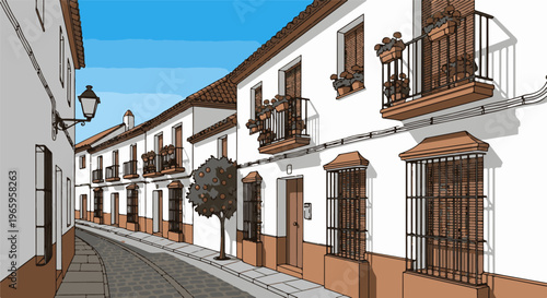 Cobblestone street lined with traditional whitewashed buildings under a blue sky