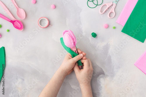 Easy flowers from spoons and crepe paper craft for kids. Hands. Mother's day. Happy birthday