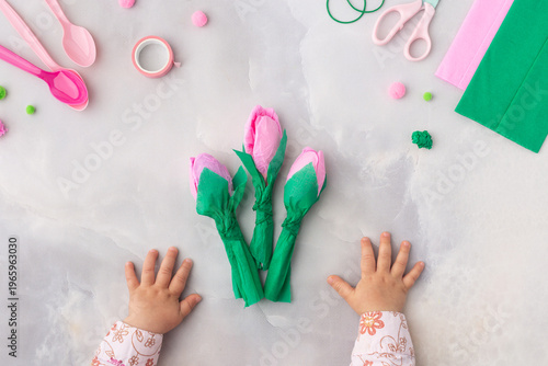 Easy flowers from spoons and crepe paper craft for kids. Hands. Mother's day. Happy birthday