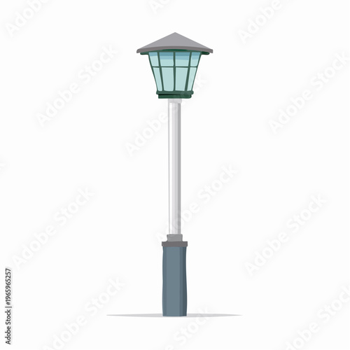 Street lamp stands tall in a city park showing light during the evening hours near walking paths and trees