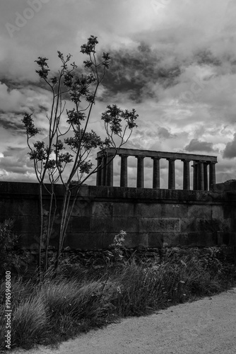Edinburgh, Scotland: black and white, view of The National Monument of Scotland, memorial to Scottish soldiers and sailors who died fighting in the Napoleonic Wars dominating the top of Calton Hill