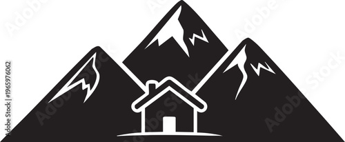 Alpine househouse silhouette against snowy mountain peaks