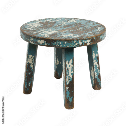 a low-profile antique round wooden utility stool featuring distressed peeling coastal blue and white paint layers, isolated on a shadowless white background. shabby chic vintage texture concept