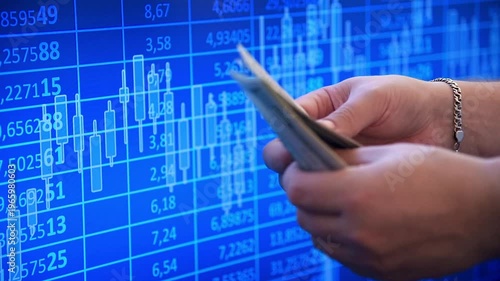 Close up of businessman hands counting dollar banknotes with stock market chart on background. Finance trading and investment concept.