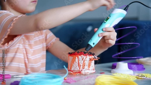 Little girl using 3d pen creating plastic toy object at table with colorful materials. Education creativity and technology concept.