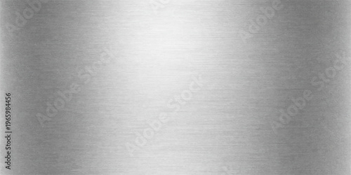 A polished silver stainless steel plate features a smooth brushed metal texture with a shiny industrial gray surface and metallic aluminum pattern for a sleek grey alloy wallpaper background