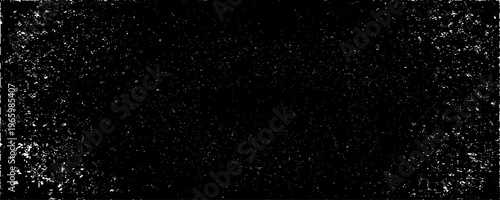 Minimalist abstract texture of scattered black specks and dust particles on a clean background.