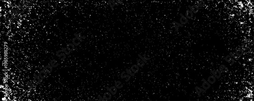 Minimalist abstract texture of scattered black specks and dust particles on a clean background.