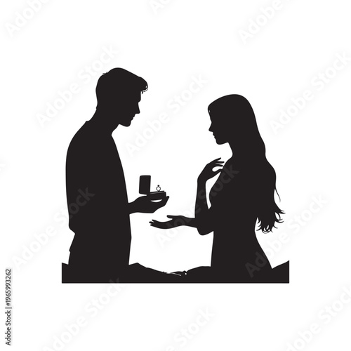 Silhouette of a man proposing marriage to a woman by presenting a ring in an open jewelry box with a romantic gesture and a