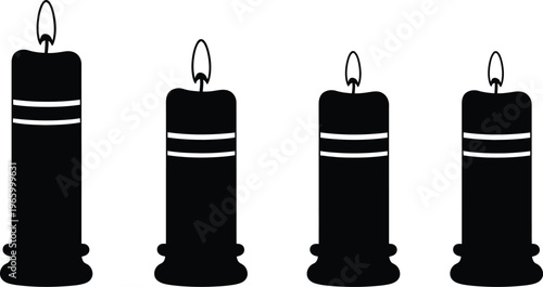 Silhouette of four unlit candles in a row with black and white
