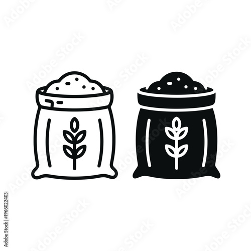 Two sacks of grain one light and one dark with leaf motifs