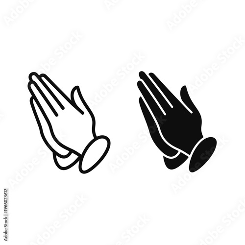 Two contrasting hands pressed together in a praying gesture