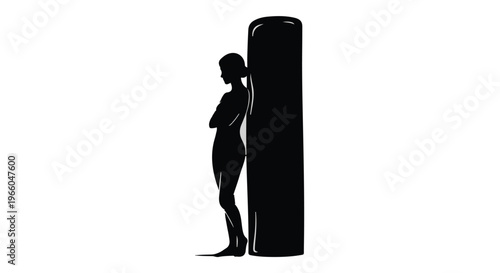 woman silhouette standing next to pillar in dark