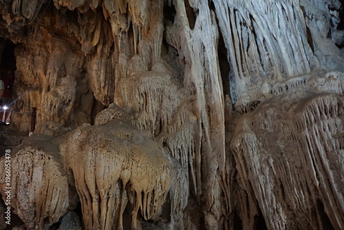Inside one of the numerous cave with stalactites and stalagmites in Vietnam
