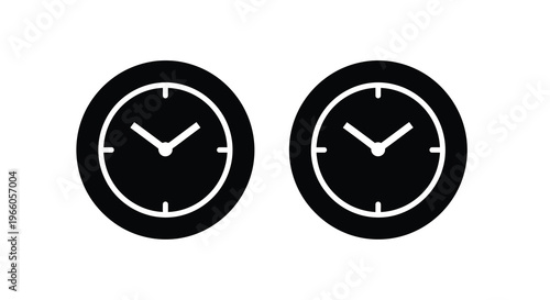 Two black circular clocks displaying slightly different times