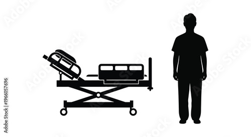 Silhouette of a person standing near a hospital bed and medical equipment