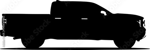 Black silhouette of a powerful pickup truck, capturing its robust form and utility from a distinct side profile view