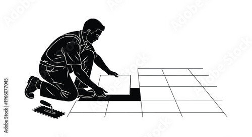 A man kneels to lay a tile on a floor showcasing the installation process in a striking silhouette high quality professional