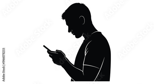 A man is looking down at his smartphone engrossed in the screen presented as a striking silhouette high quality professional detailed